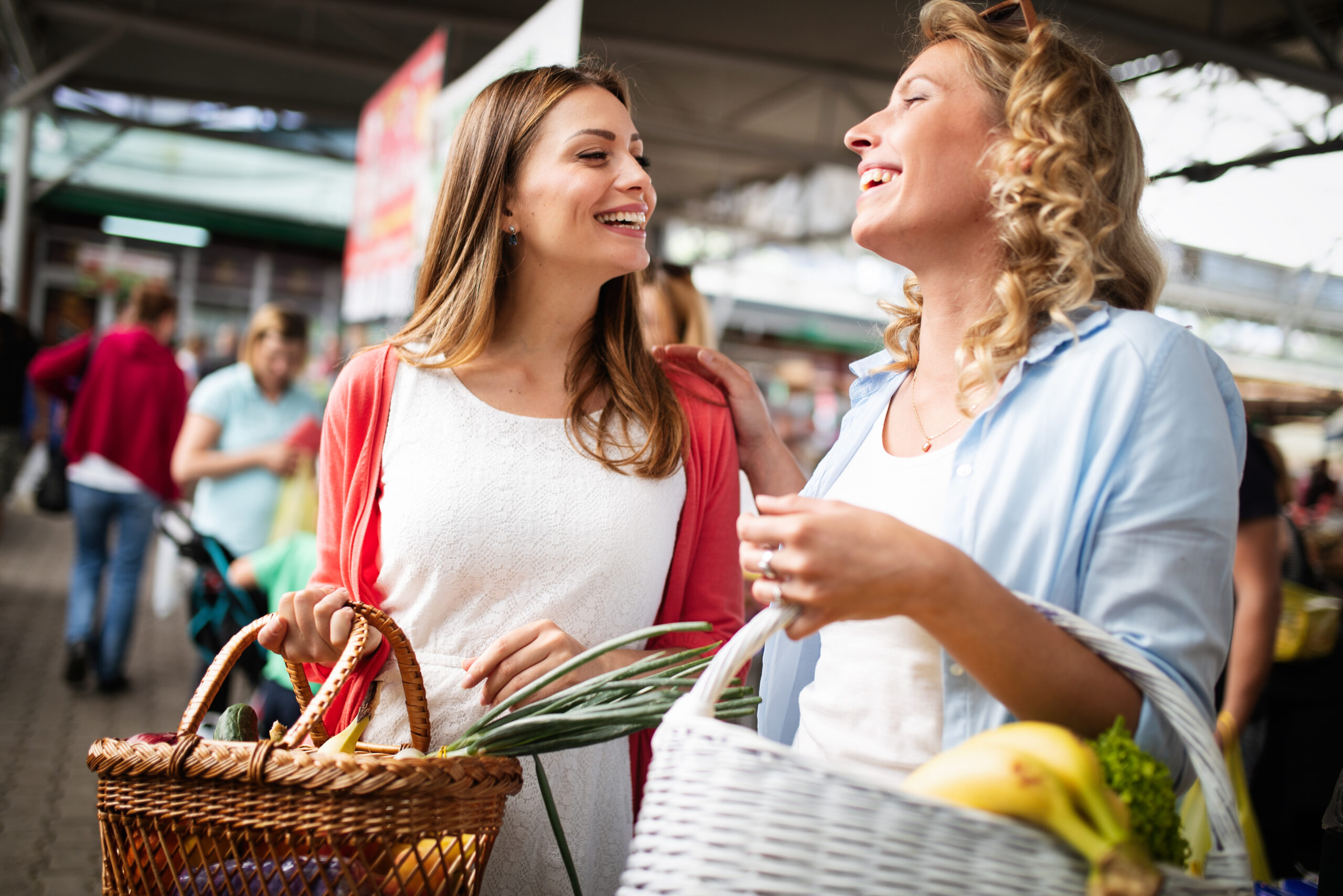 Beautiful healthy women shopping vegetables and fruits